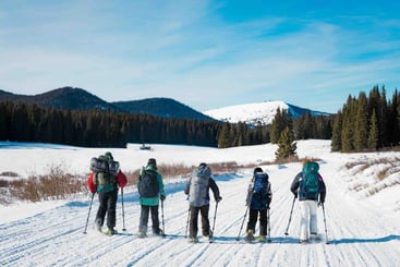 5th graders working together to set up a tent to sleep in for the 2-night hut trip. 